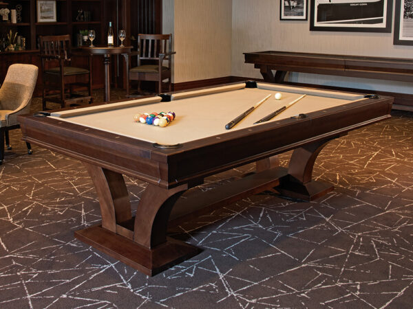 room setting featuring pool table with billiards accessories on its playing surface